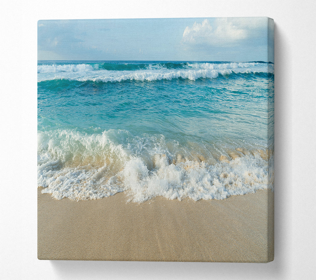  A Canvas Print of Crashing waves on the sandy beach Canvas Art