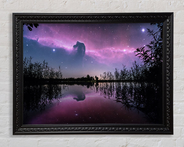Horse head nebula over a purple lake Framed Print