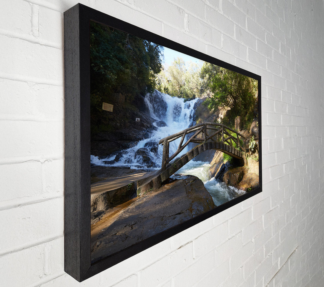  A Canvas Print of Rustic made bridge by a waterfall Canvas Print