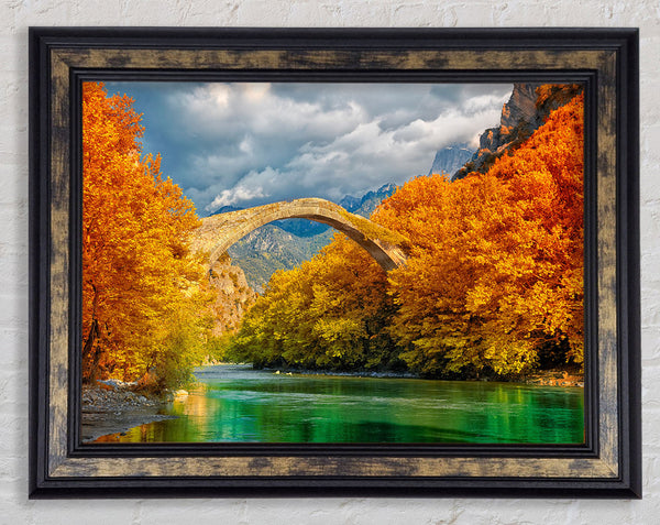 bridge over the autumn lake Framed Print
