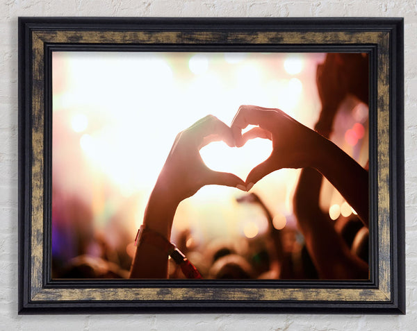 Heart hands in the air Framed Print