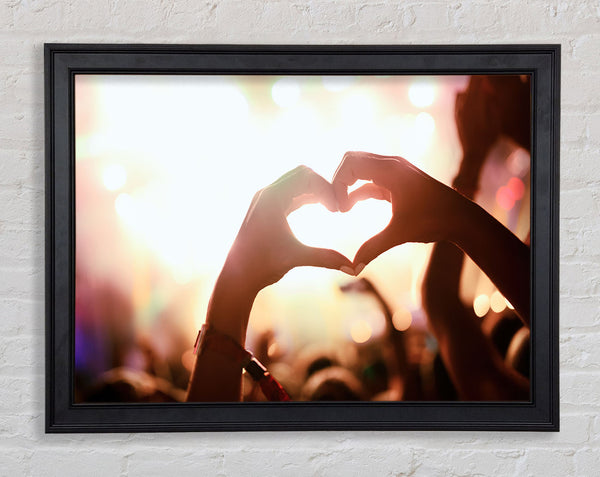 Heart hands in the air Framed Print