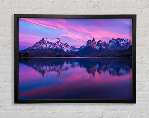 Purple and blue mountains above lake Framed Print