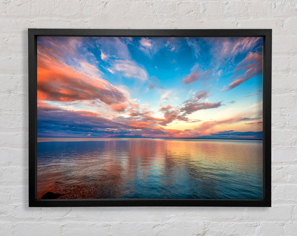 Stunning skies above the sea Framed Print