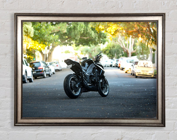 Motorbike on the street Framed Print