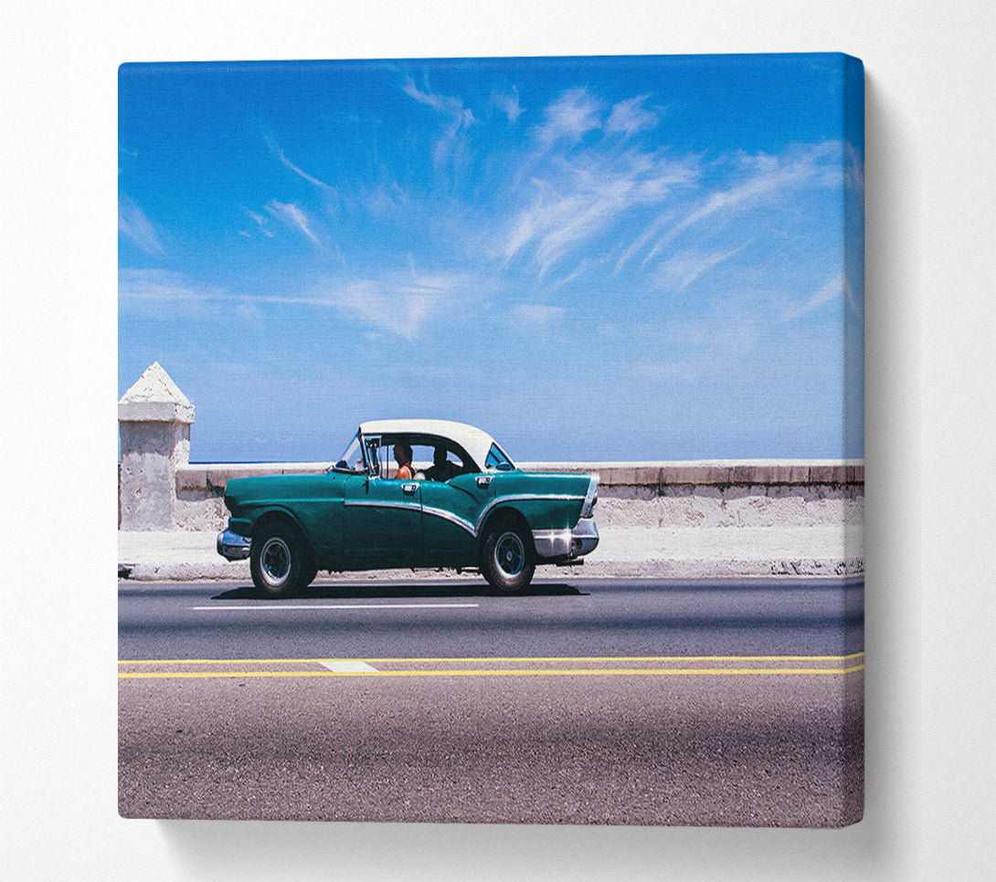  A Canvas Print of Classic car down the highway Canvas Print
