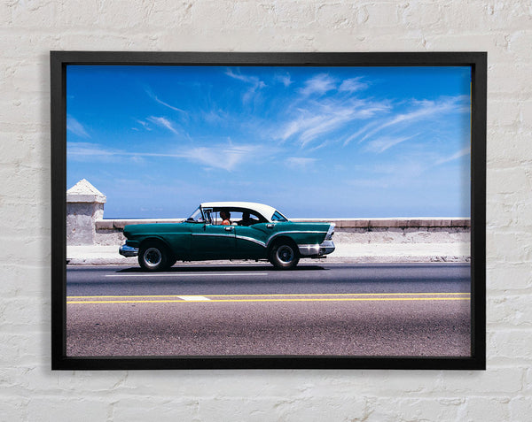 Classic car down the highway Framed Print