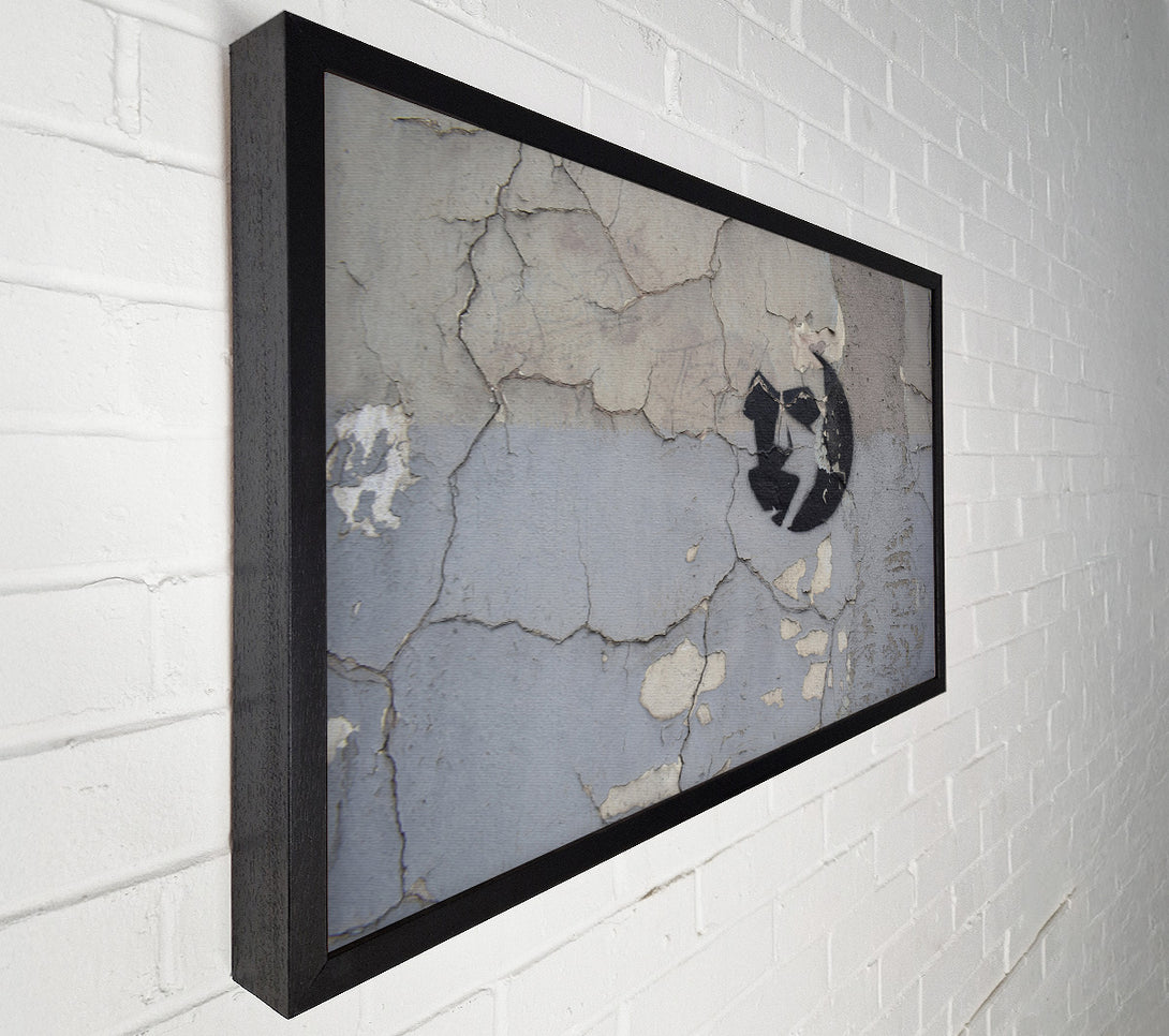  A Canvas Print of Simple street art on eroded wall Canvas Print