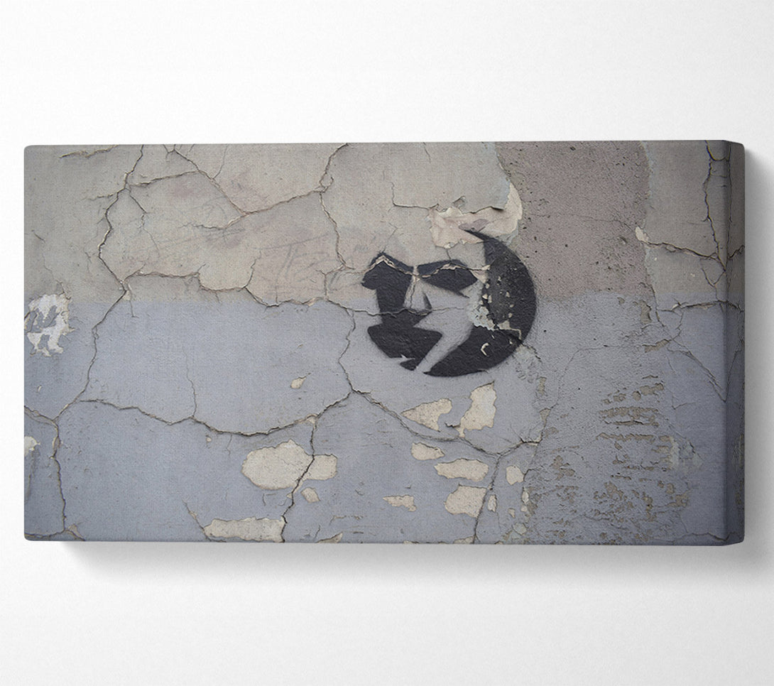  A Canvas Print of Simple street art on eroded wall Canvas Print