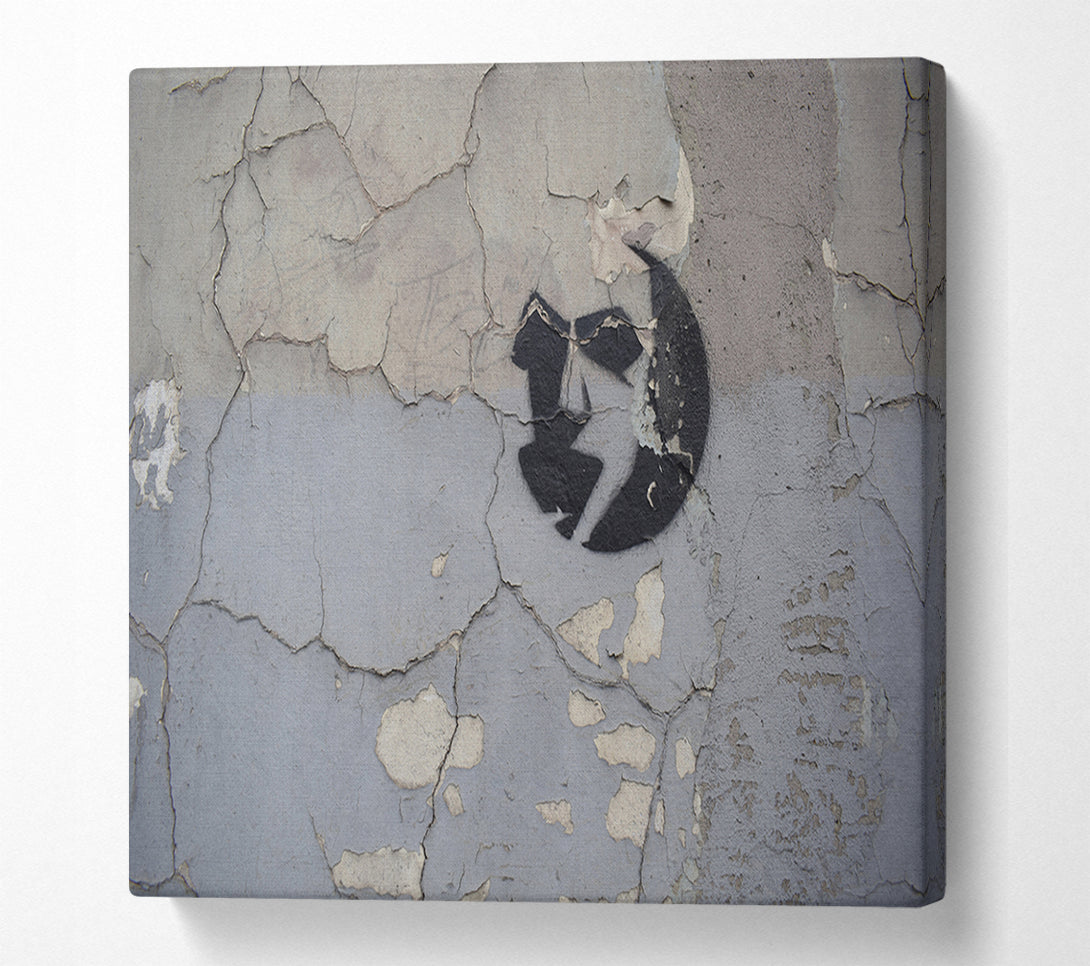  A Canvas Print of Simple street art on eroded wall Canvas Print