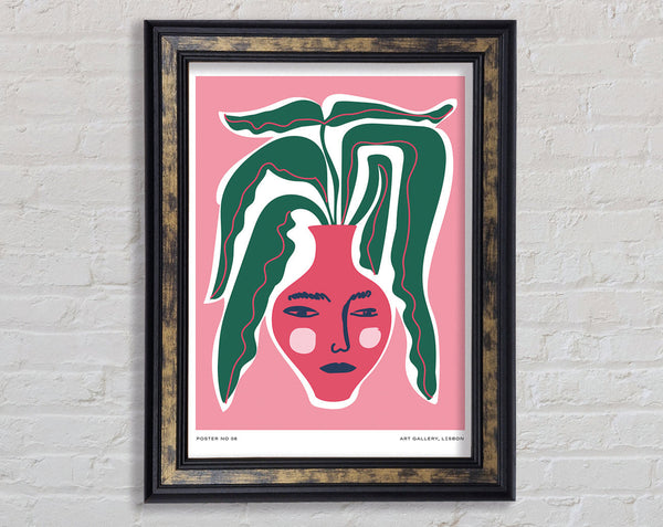 Green Leaves In A Pink Vase Framed Print