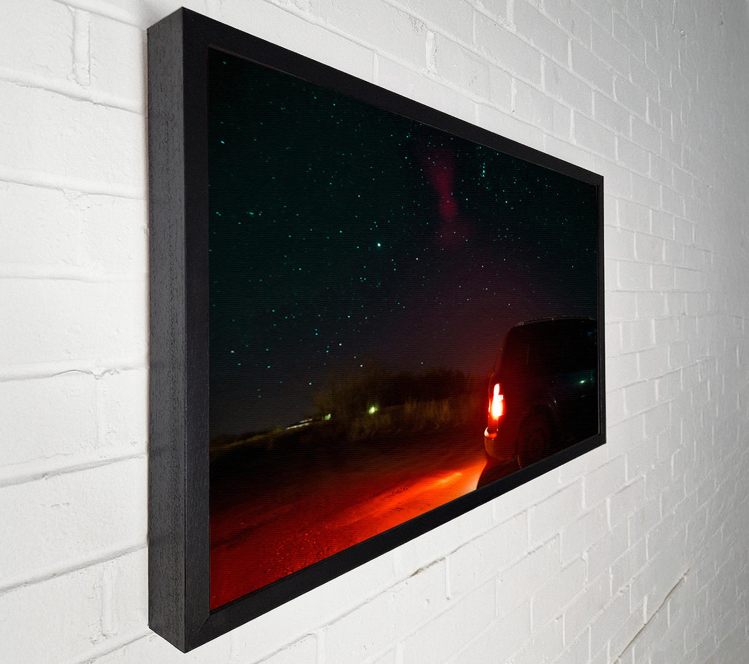  A Canvas Print of Red Taillights Under Stars Canvas Print