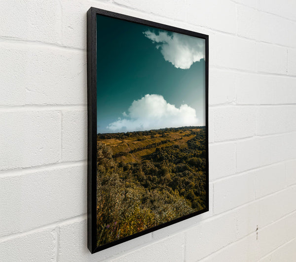 Teal Clouds Over Hills