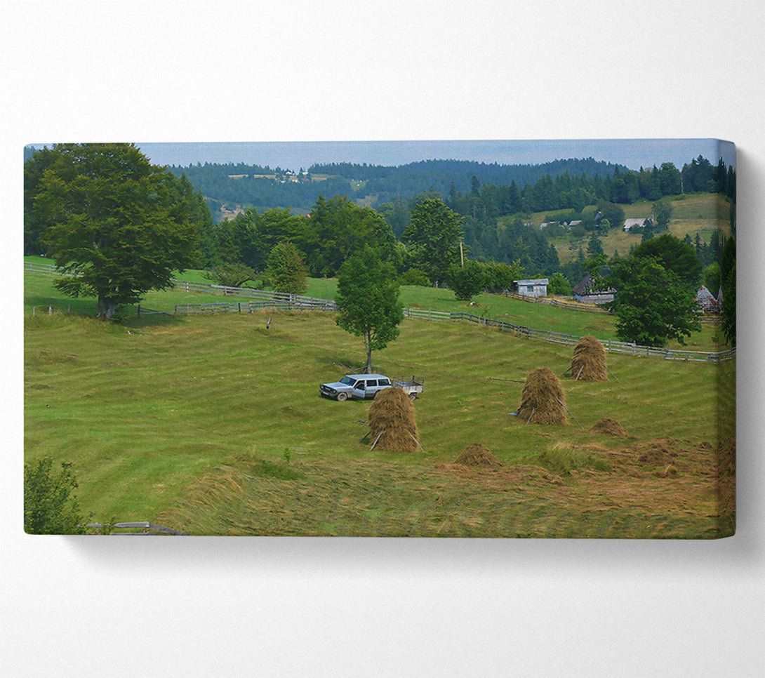  A Canvas Print of Green Hills And Haystacks Canvas Print
