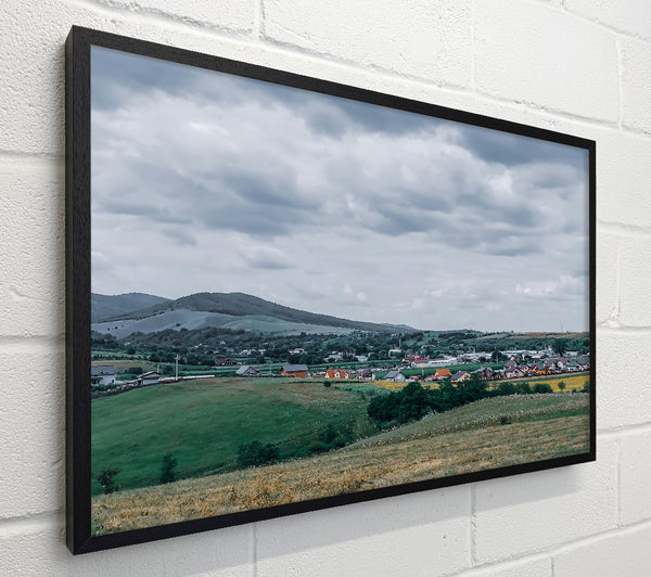 Green Hills Under Grey Skies
