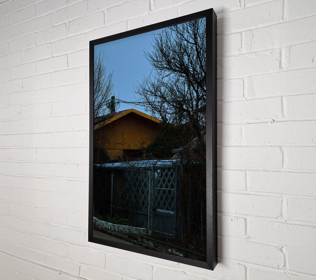  A Canvas Print of Yellow House Behind Branches Canvas Art
