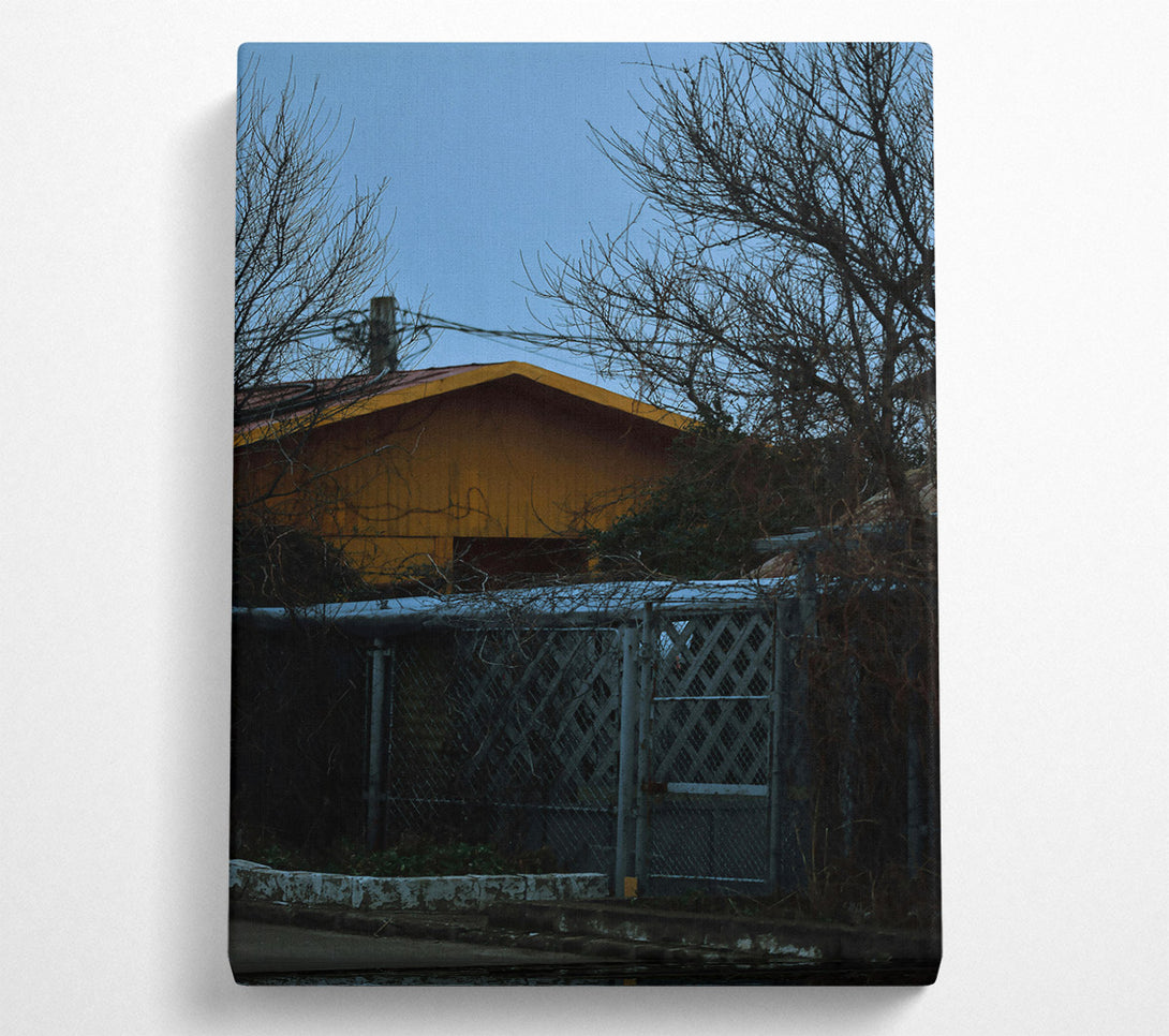  A Canvas Print of Yellow House Behind Branches Canvas Art