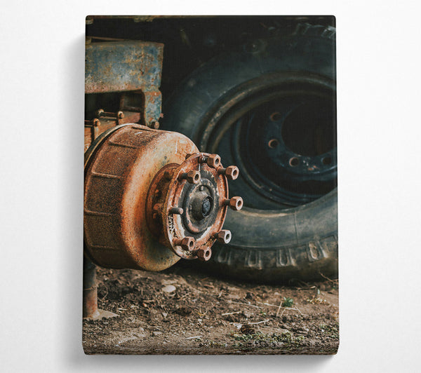  A Canvas Print of Rusty Brown Hubcap Canvas Print