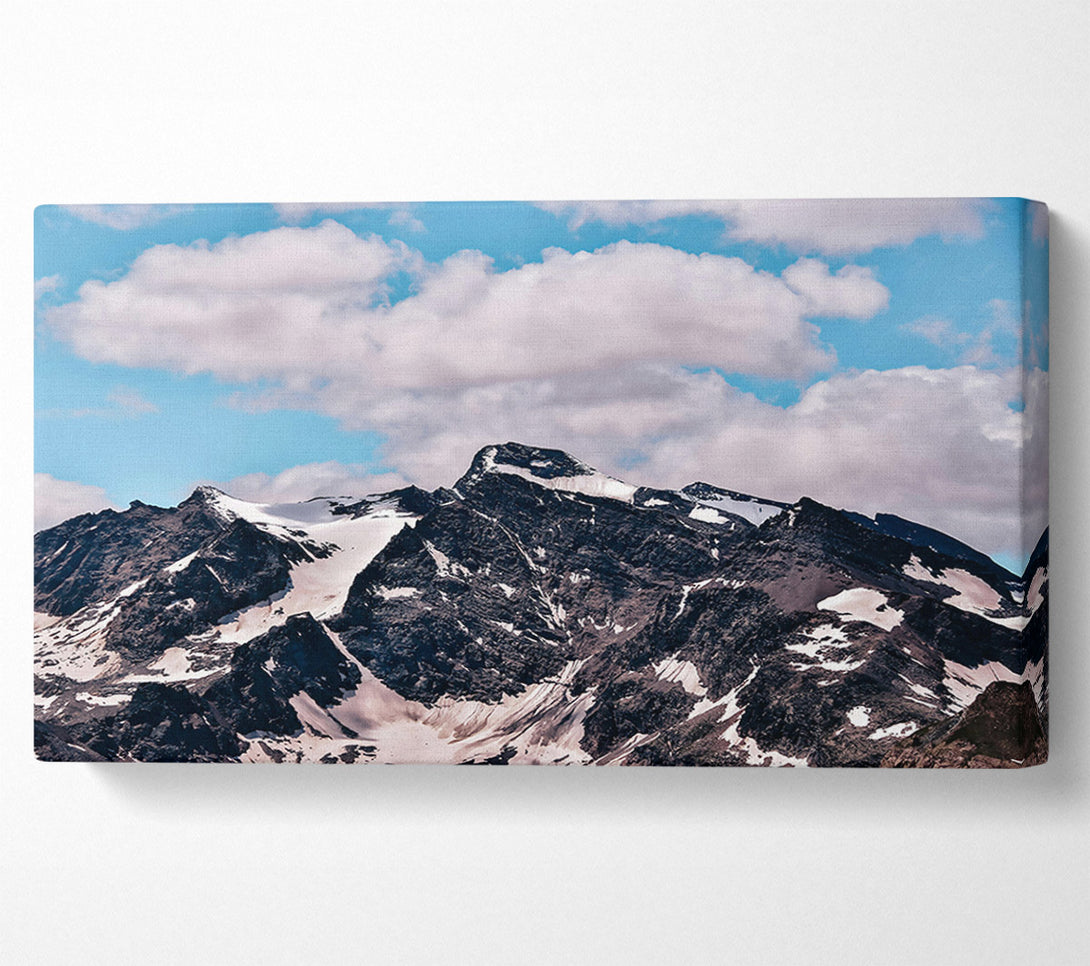  A Canvas Print of Black Peaks Under Clouds Canvas Print