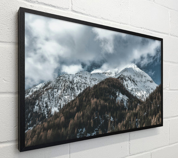 White Peaks Through Clouds