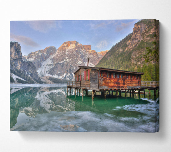  A Canvas Print of Green Cabin Reflects Mountains Canvas Print