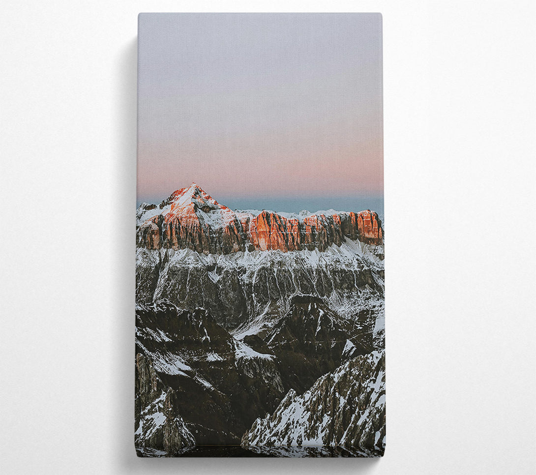  A Canvas Print of Pink-Kissed Mountain Peaks Canvas Print