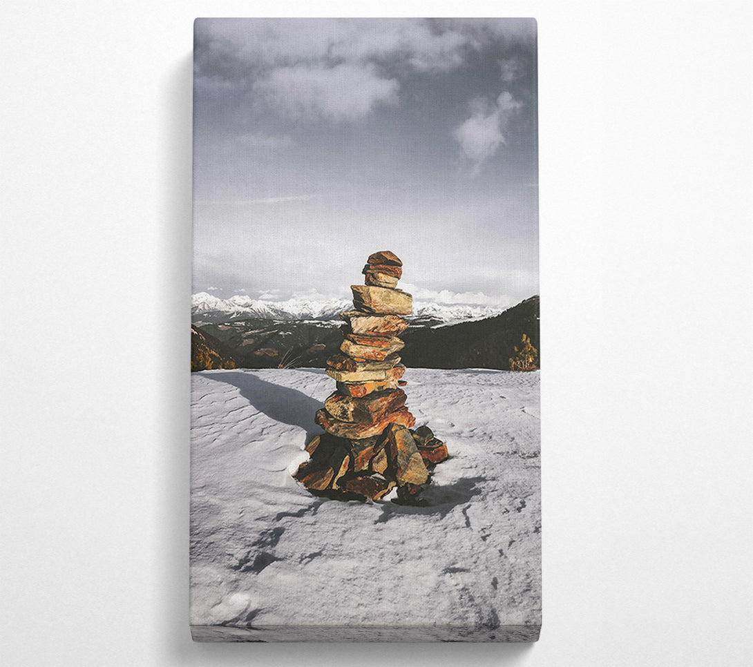 A Canvas Print of Red Stone Cairn In Snow Canvas Art
