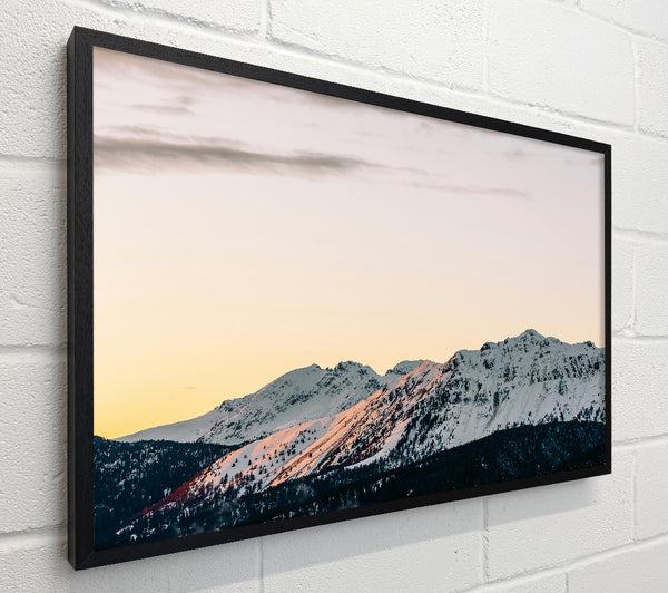 Pink-Kissed Snowy Peaks