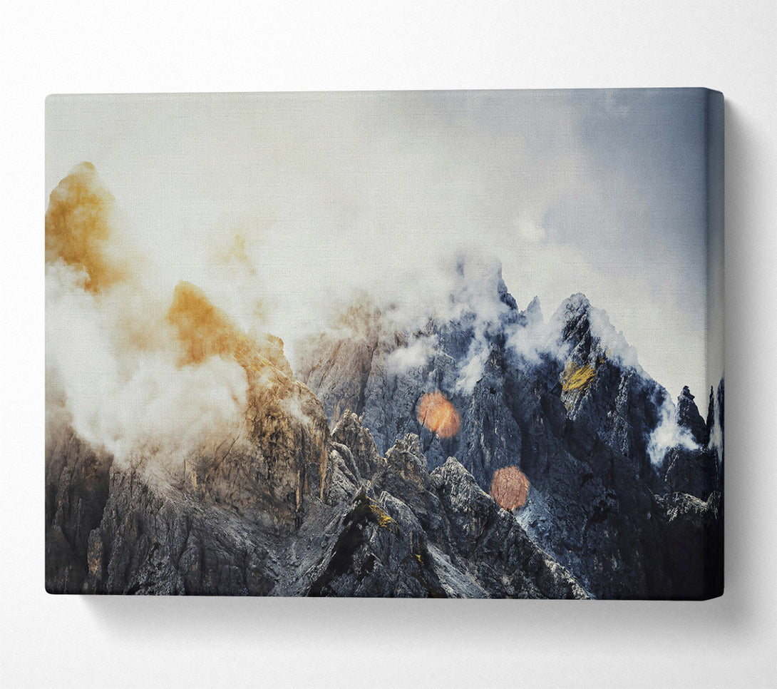  A Canvas Print of Golden Peaks In Fog Canvas Print