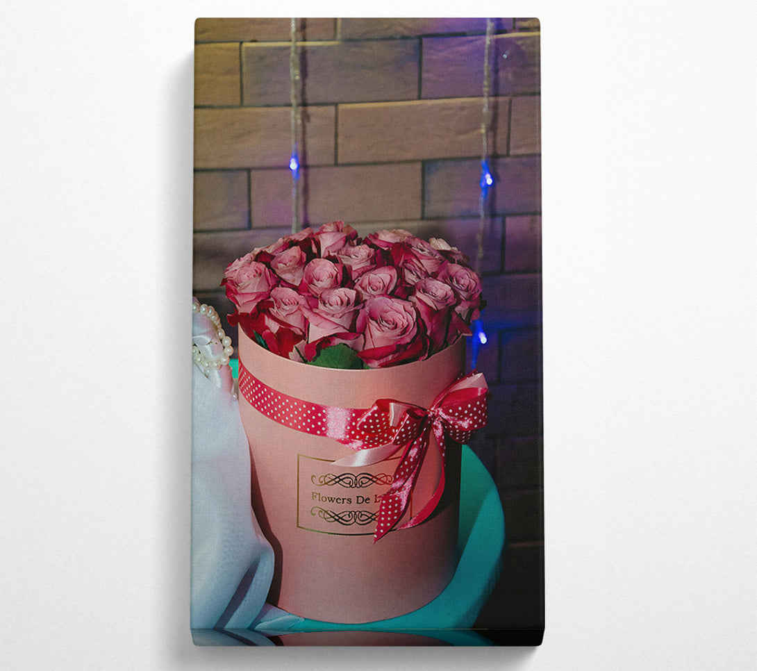  A Canvas Print of Pink Roses In A Box. Canvas Print