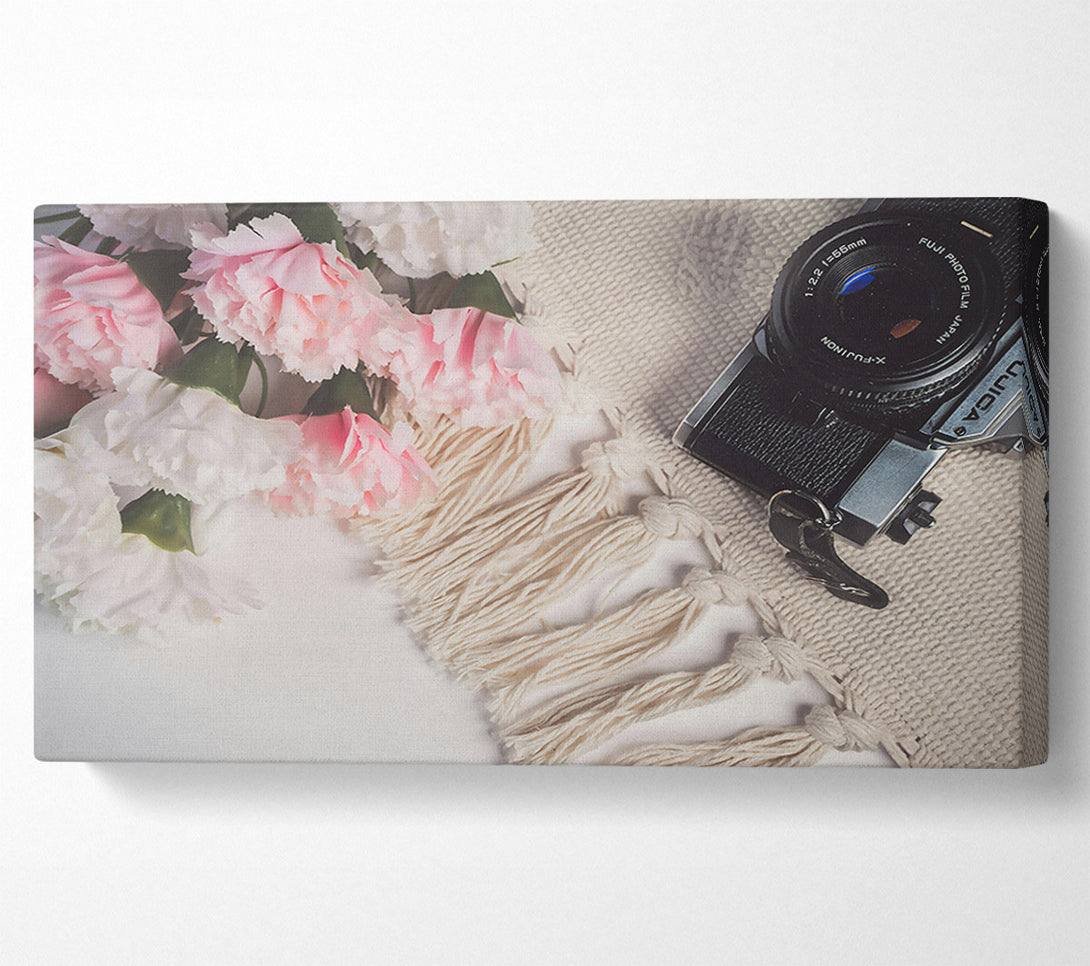  A Canvas Print of Pink Blooms And Film Camera Canvas Print