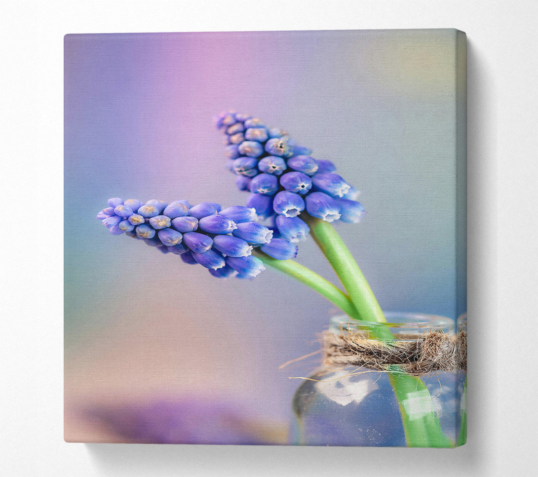  A Canvas Print of Blue Blooms In Glass Canvas Print