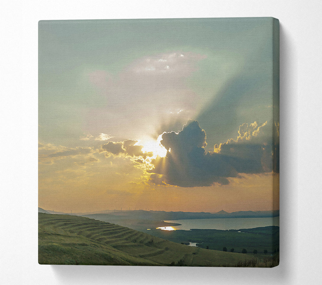  A Canvas Print of Golden Rays Through Clouds Canvas Print
