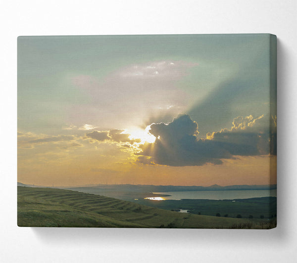  A Canvas Print of Golden Rays Through Clouds Canvas Print