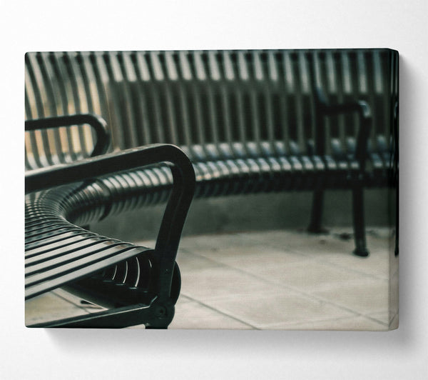 A Canvas Print of Black Metal Bench Rows Canvas Print