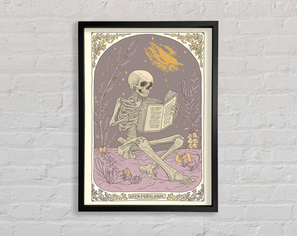 The Skull Reader Framed Print