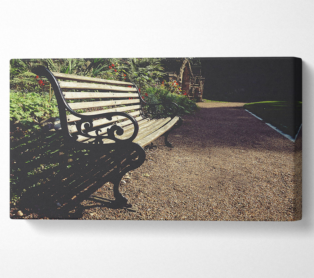  A Canvas Print of Black Bench In The Sun. Canvas Art