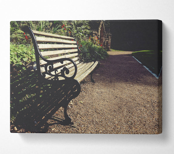  A Canvas Print of Black Bench In The Sun. Canvas Art