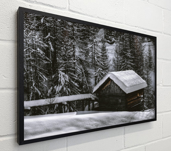 White Cabin Under Snow