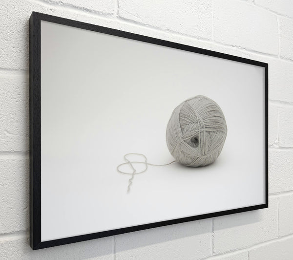 Gray Yarn Ball Unraveling