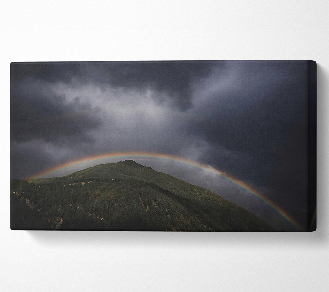  A Canvas Print of Grey Sky Rainbow Canvas Print