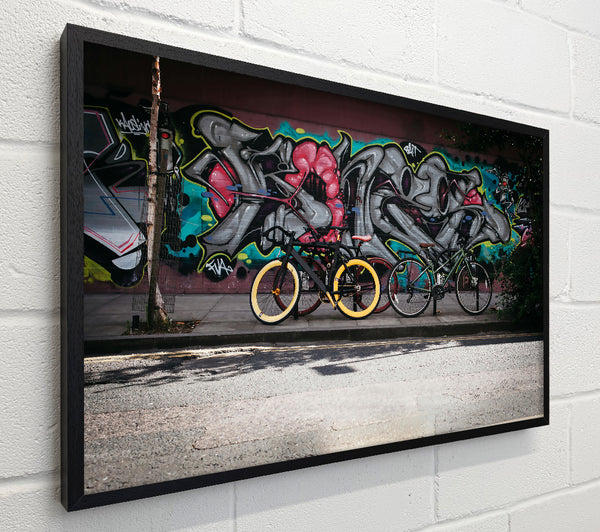 Yellow Bikes On Grey Wall