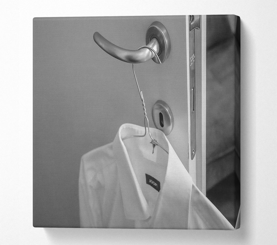  A Canvas Print of White Shirt On A Door Handle Canvas Print