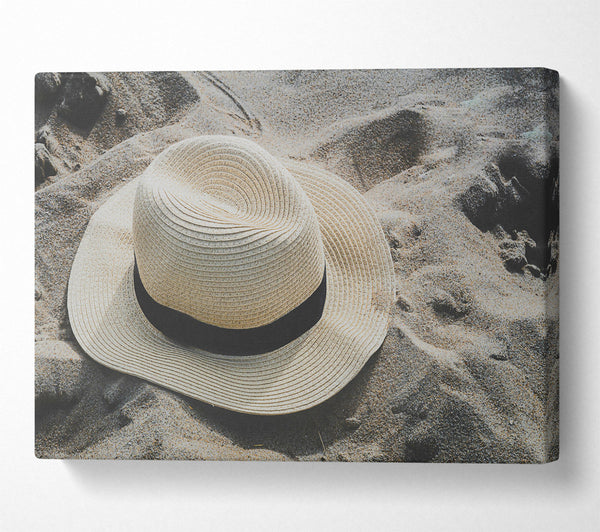  A Canvas Print of Tan Hat On Sand Canvas Print