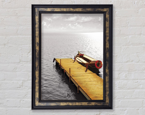 Boat By The Boardwalk Framed Print