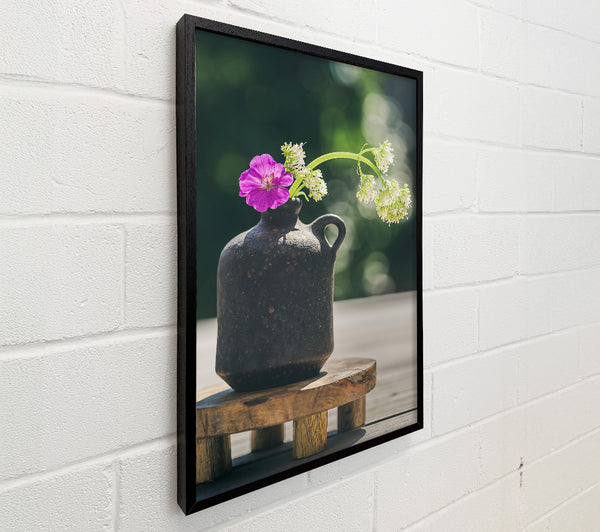 Black Vase With Purple Bloom.