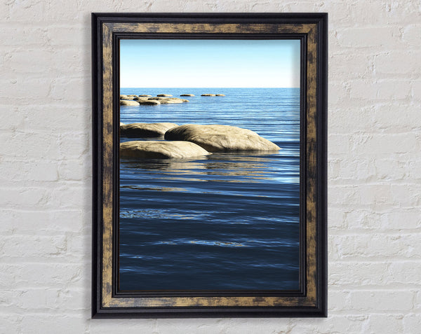 Calm Sea Rocks Framed Print