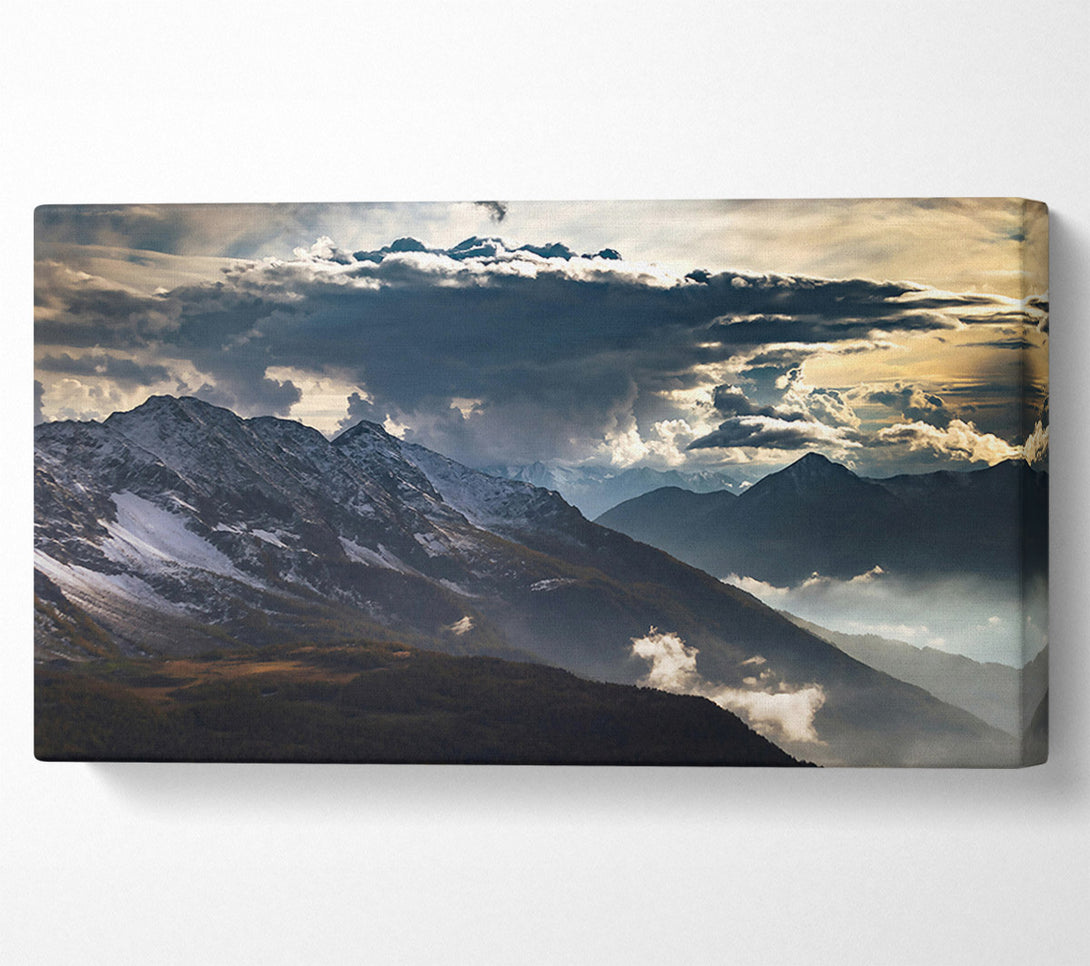  A Canvas Print of Gray Clouds Over Peaks Canvas Art