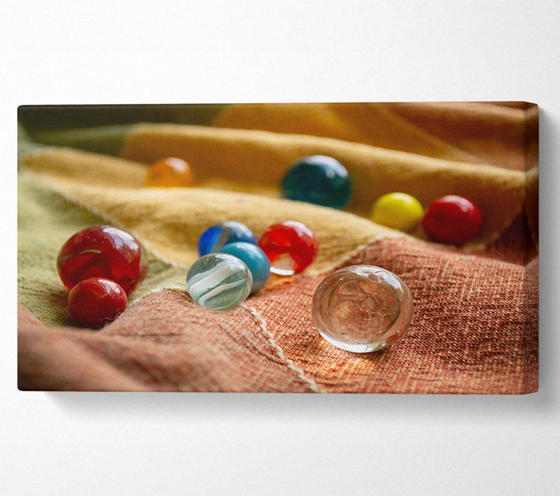  A Canvas Print of Clear Marbles On Fabric Canvas Print