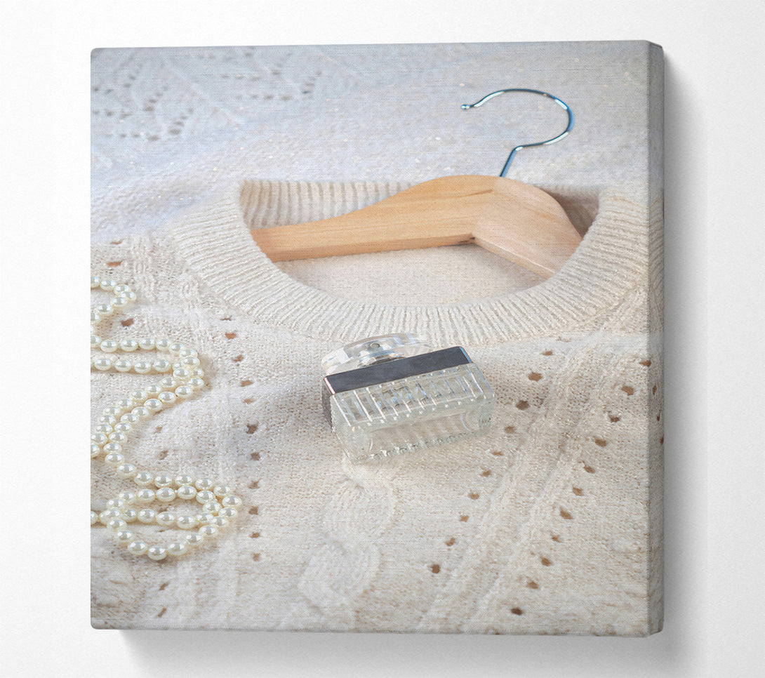  A Canvas Print of Ivory Knit And Perfume Canvas Wall Art